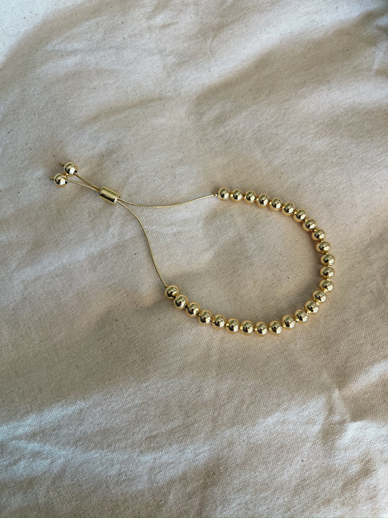 PULSERA ESFERA - Bañada en Oro